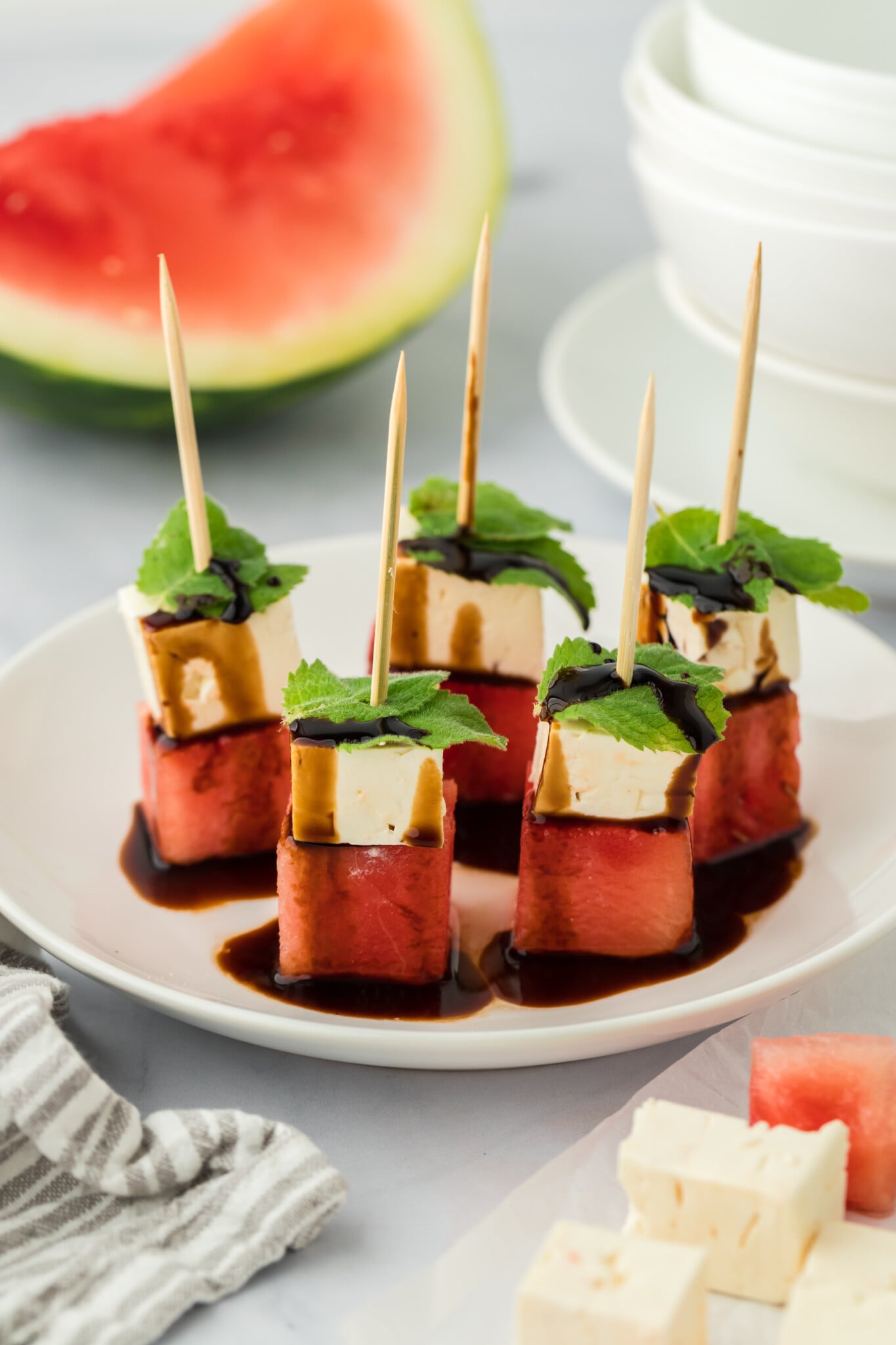 Watermelon feta bites with mint on toothpicks