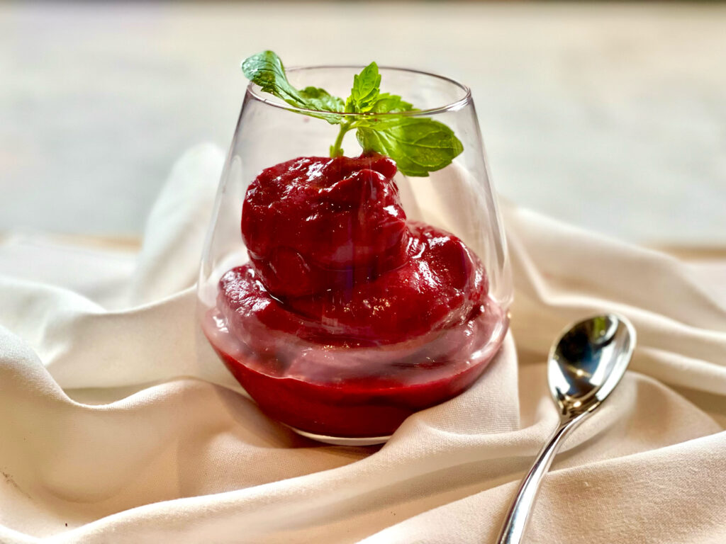 Cherry Chardonnay Sorbet in a glass with a spoon