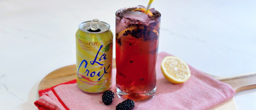 Blackberry LimonCello Mocktail with a can of La Croix next to it.
