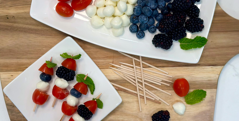 Photo of Blueberry Caprese Skewers on a white plate
