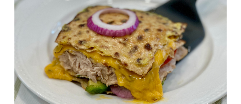 Tuna Melt Matzah Sandwich on a white plate.